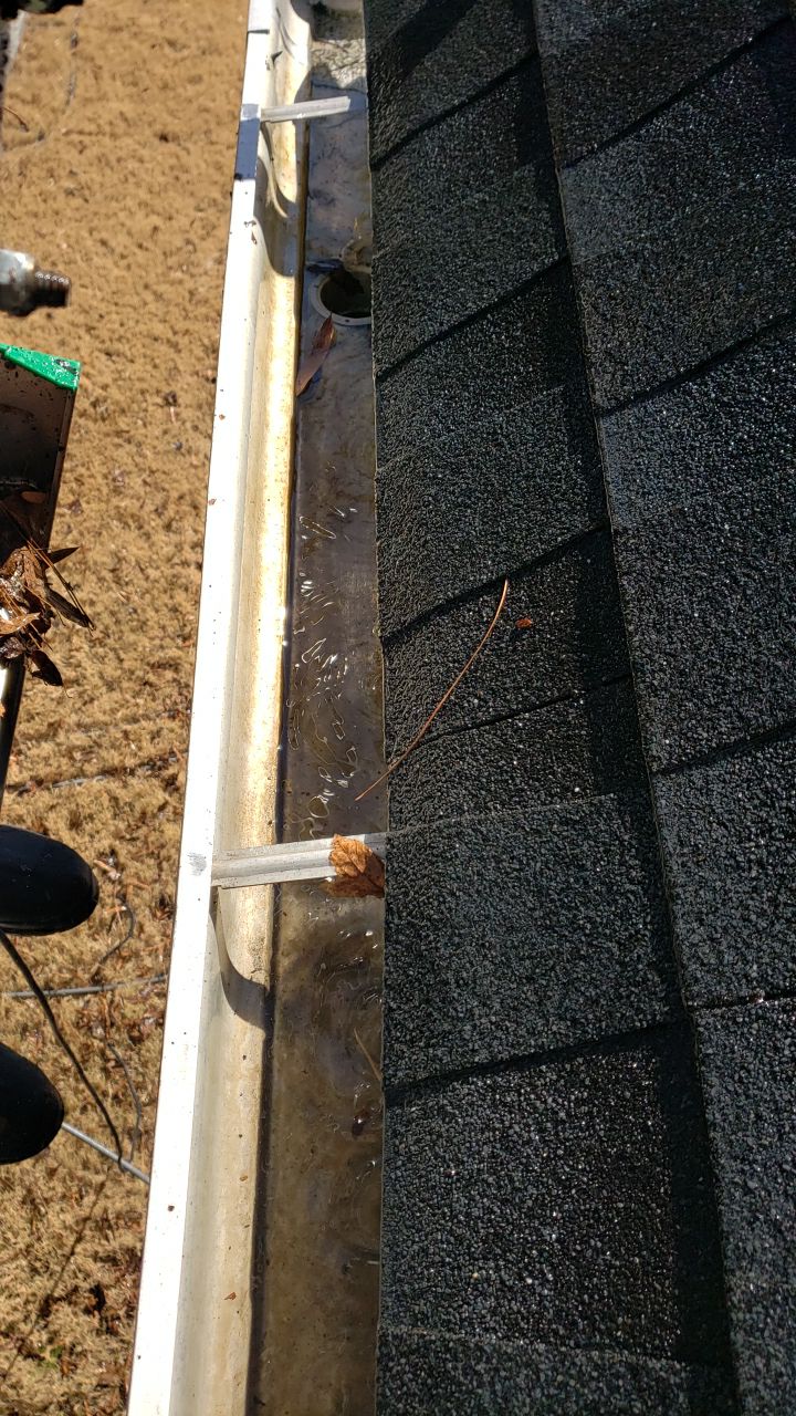 Gutter Cleaning using water