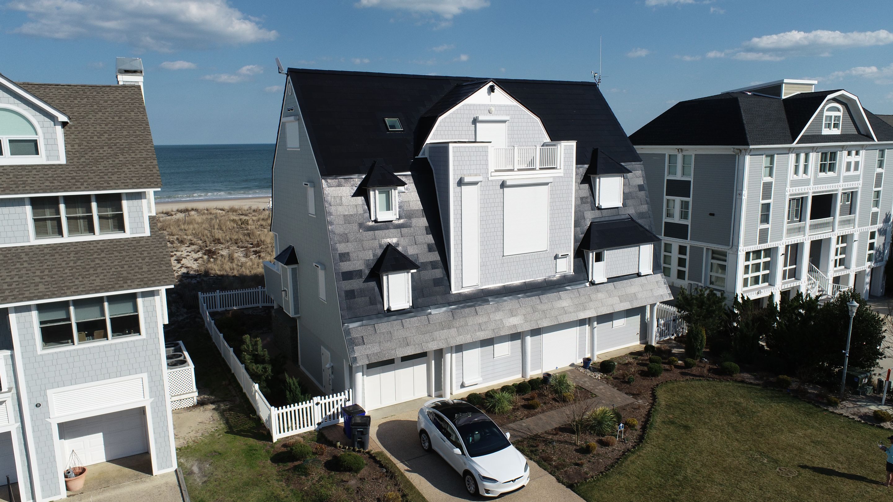 World's Steepest Tesla Solar Roof! by American Home Contractors