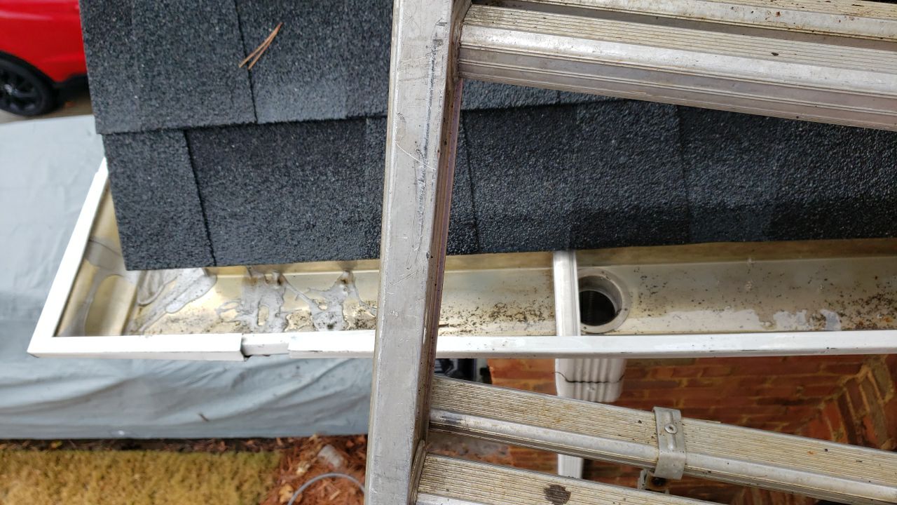 Gutter Cleaning using water