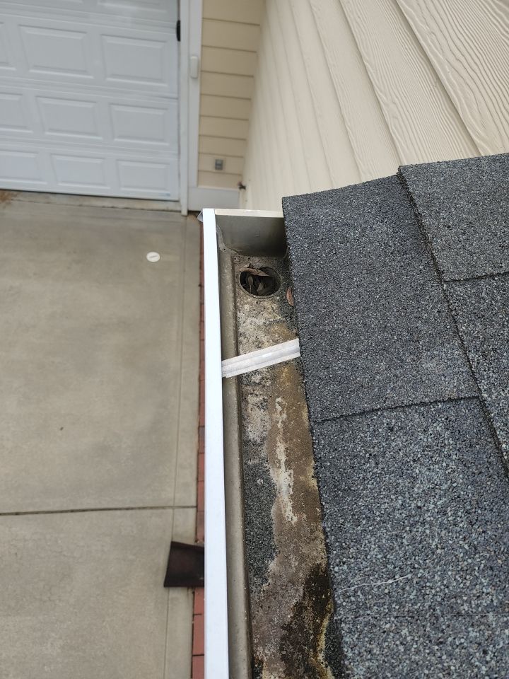 Gutter Cleaning using cleaner
